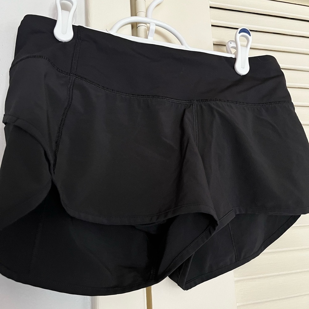 lululemon athletic solid black speed shorts 4